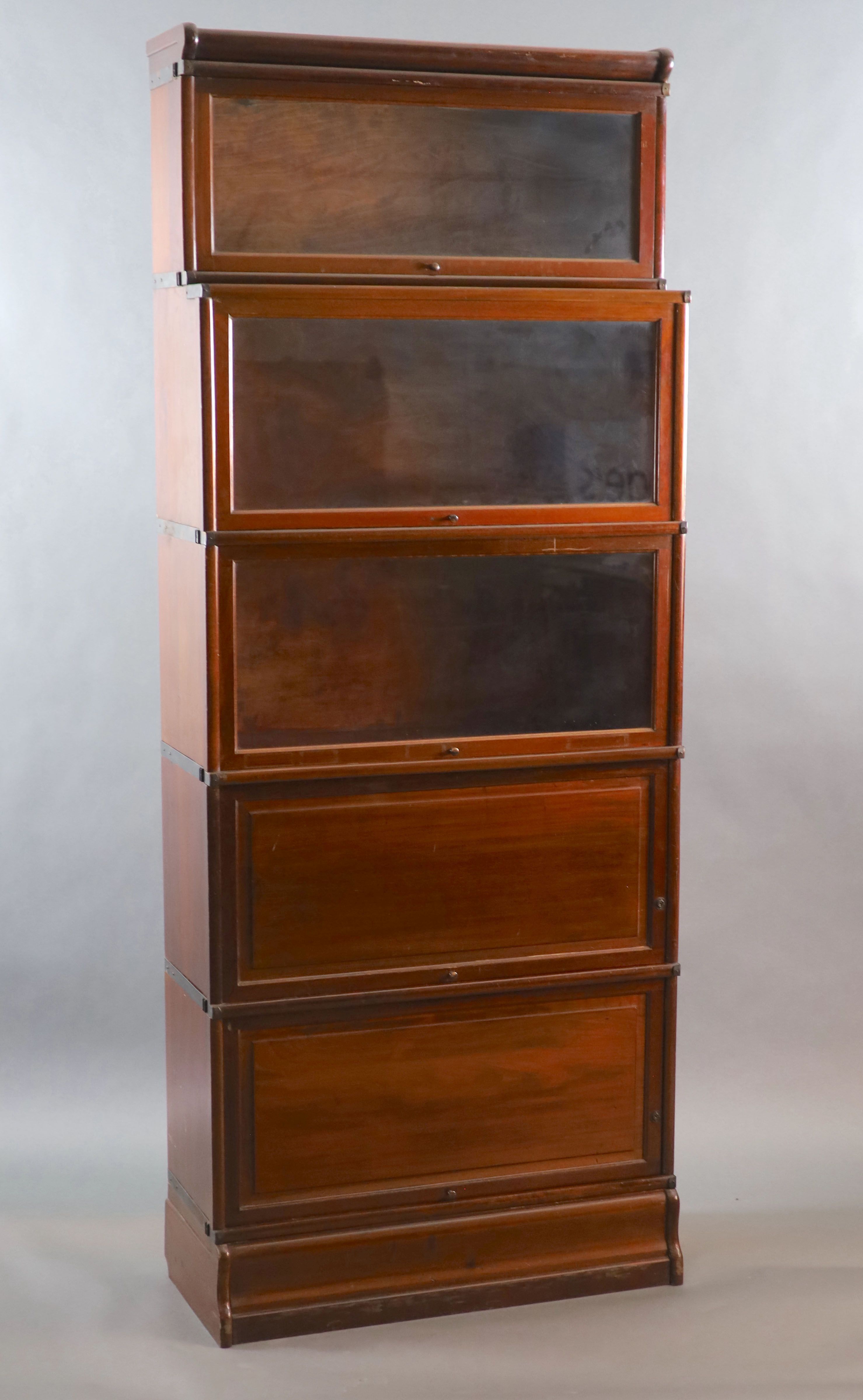 A Globe Wernicke mahogany sectional bookcase, W.87cm D.37cm H.216cm.